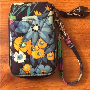 Floral Vera Bradley wallet with zip closure.